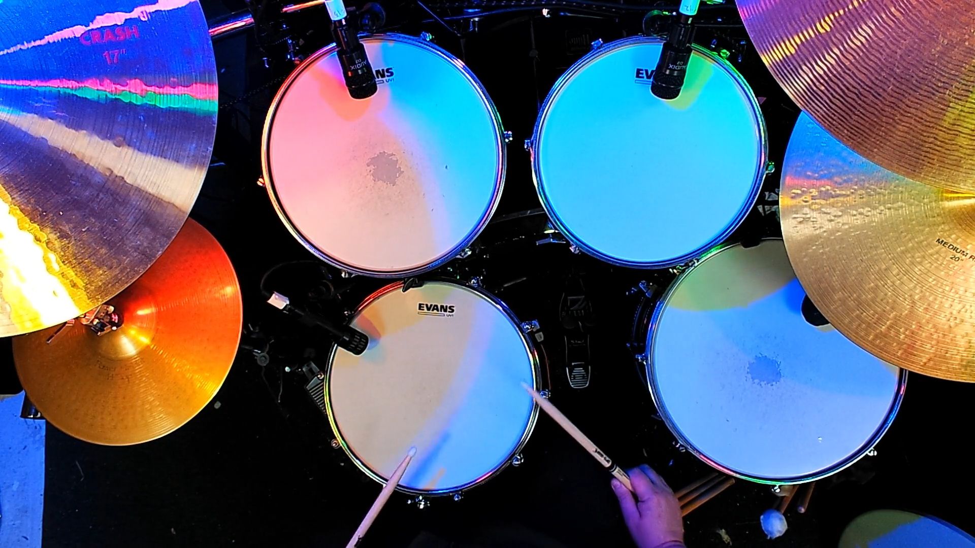 Drum kit with colorful lighting